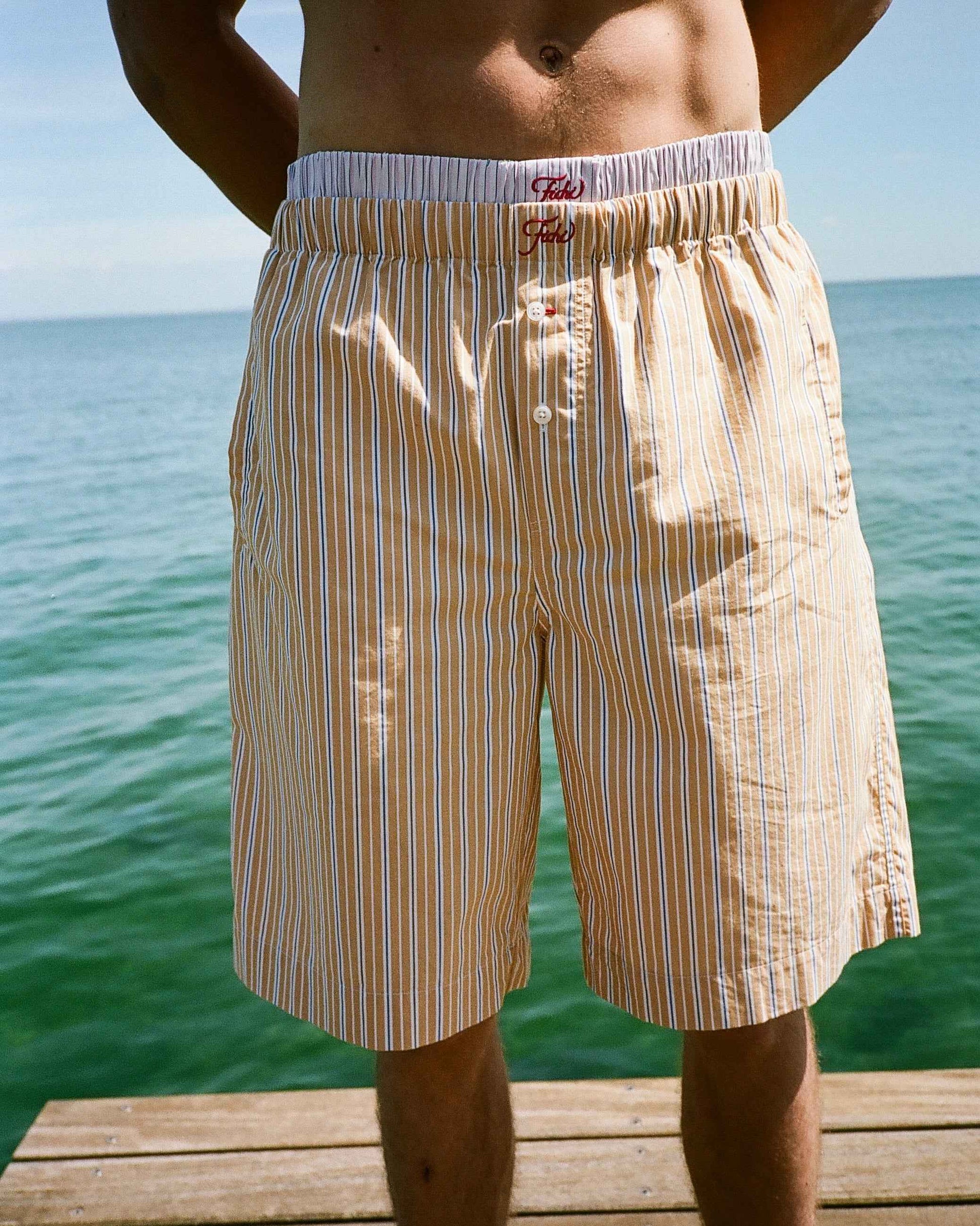 Yellow stripe Bermuda shorts