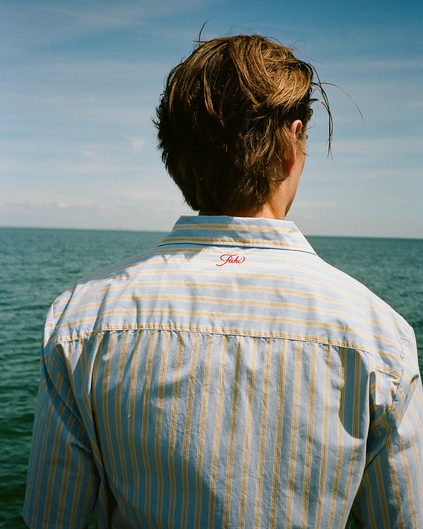 blue & yellow shirt